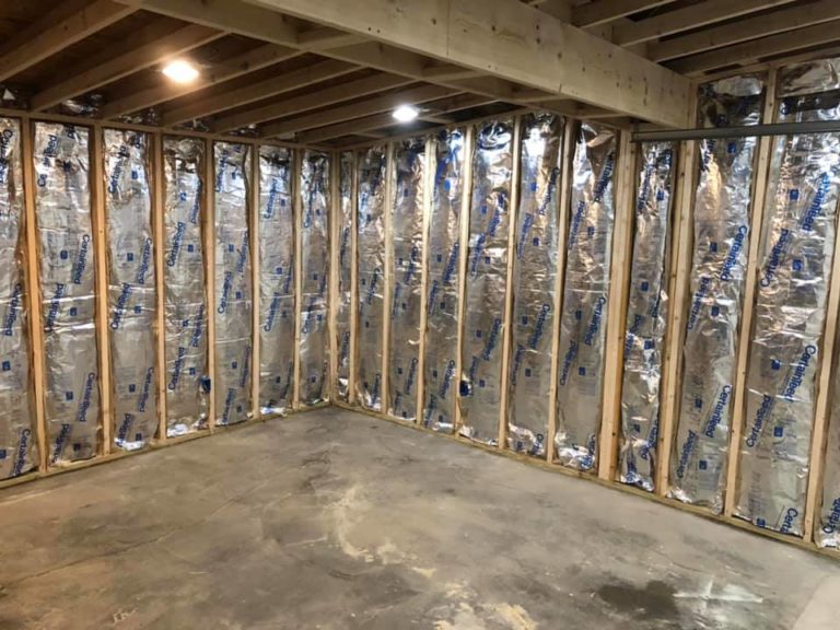 Interior walls framed and insulated during a renovation by Peak Precision Contracting