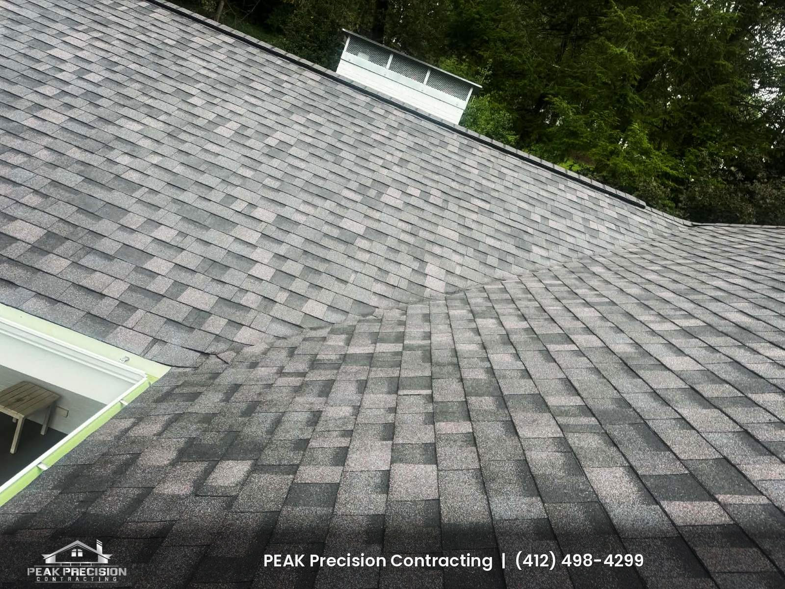 Finished shingle roof with chimney and roof valley detail by Peak Precision Contracting in Upper St. Clair, PA