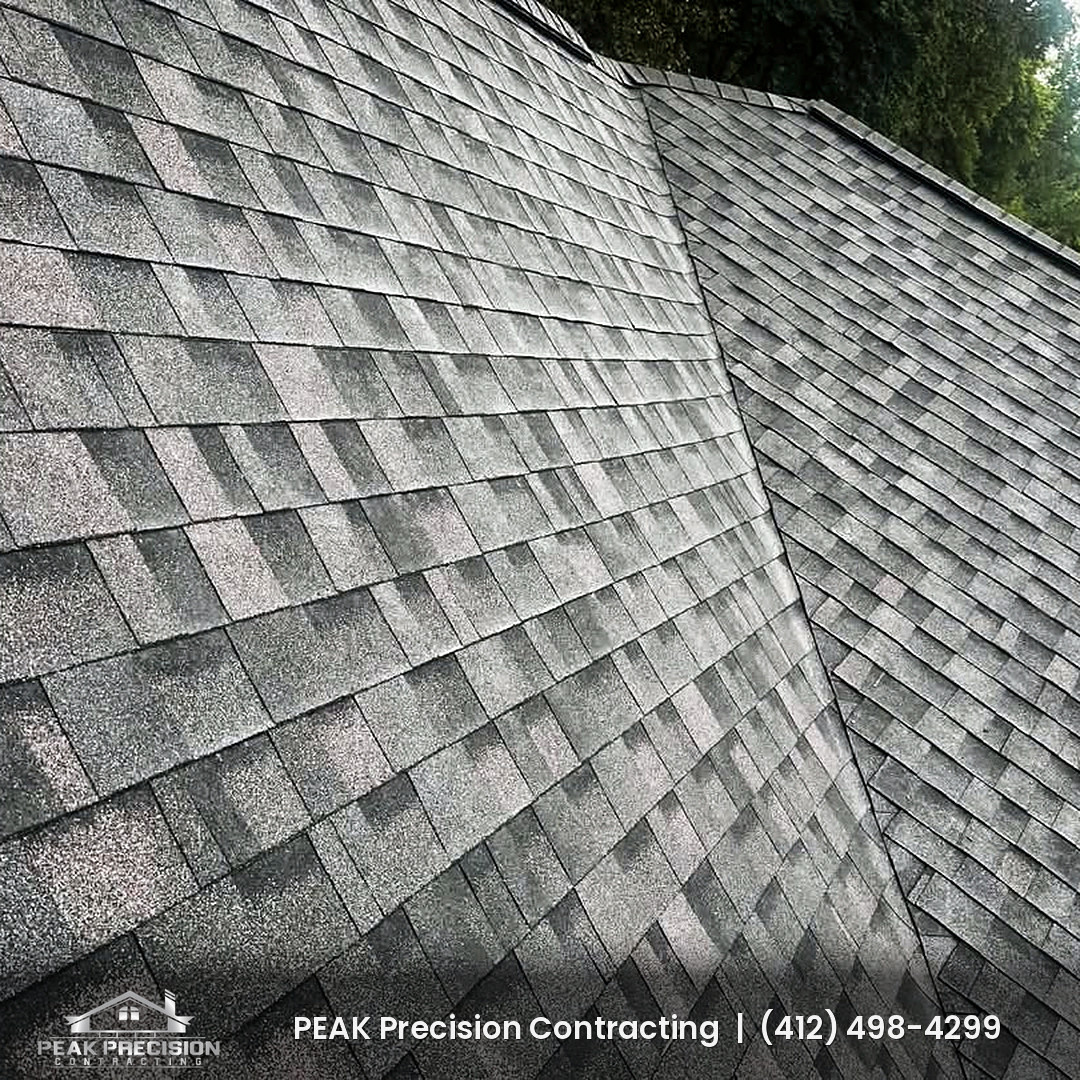 Close-up of asphalt shingle field and valley on a South Hills PA roof after fall weather