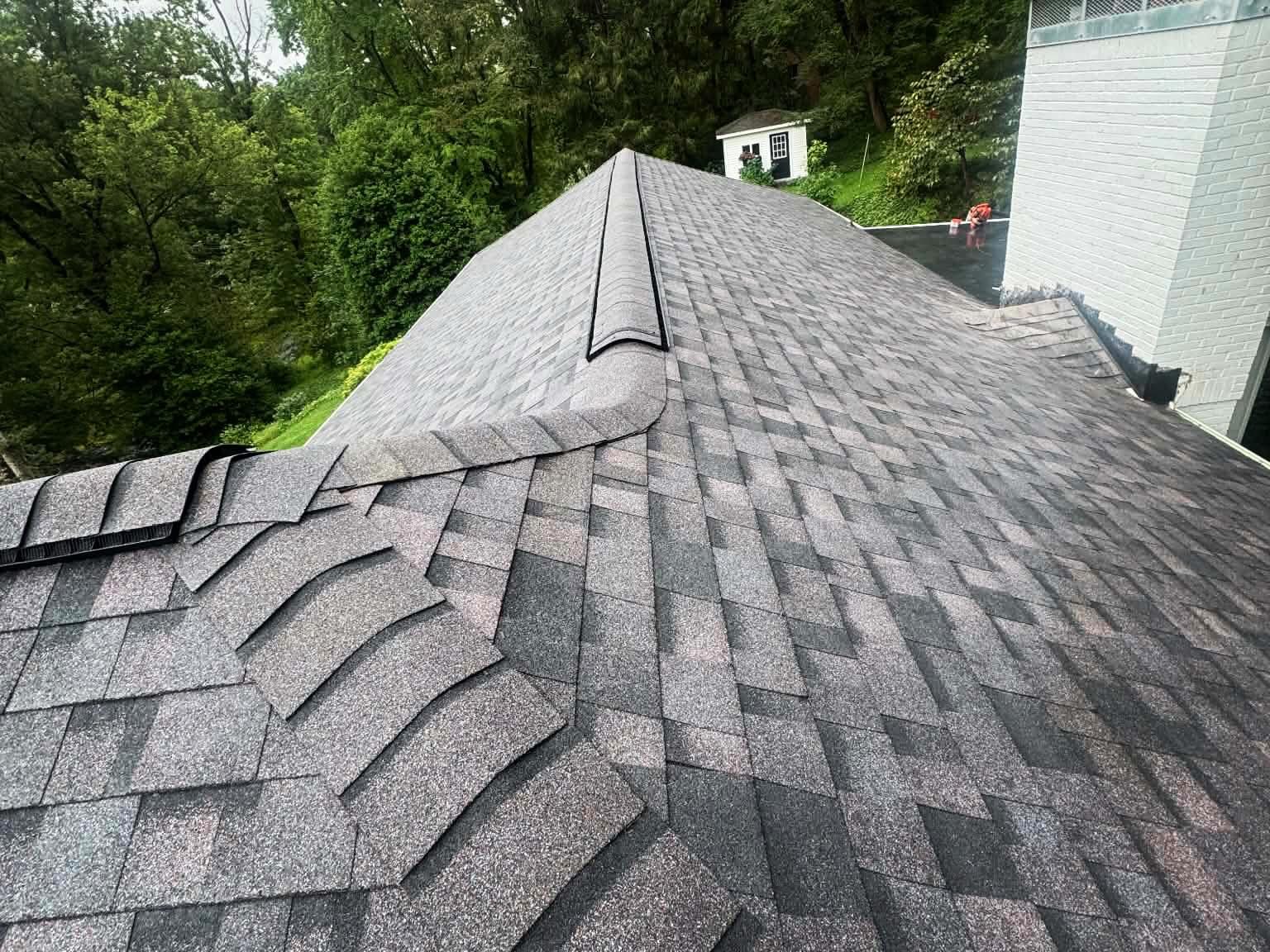 New shingle roof plane installed by Peak Precision Contracting