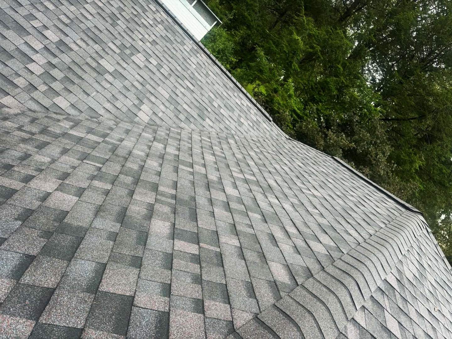 New shingle roof plane installed by Peak Precision Contracting
